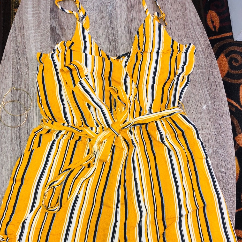 Cute Stripped romper. Never wore.